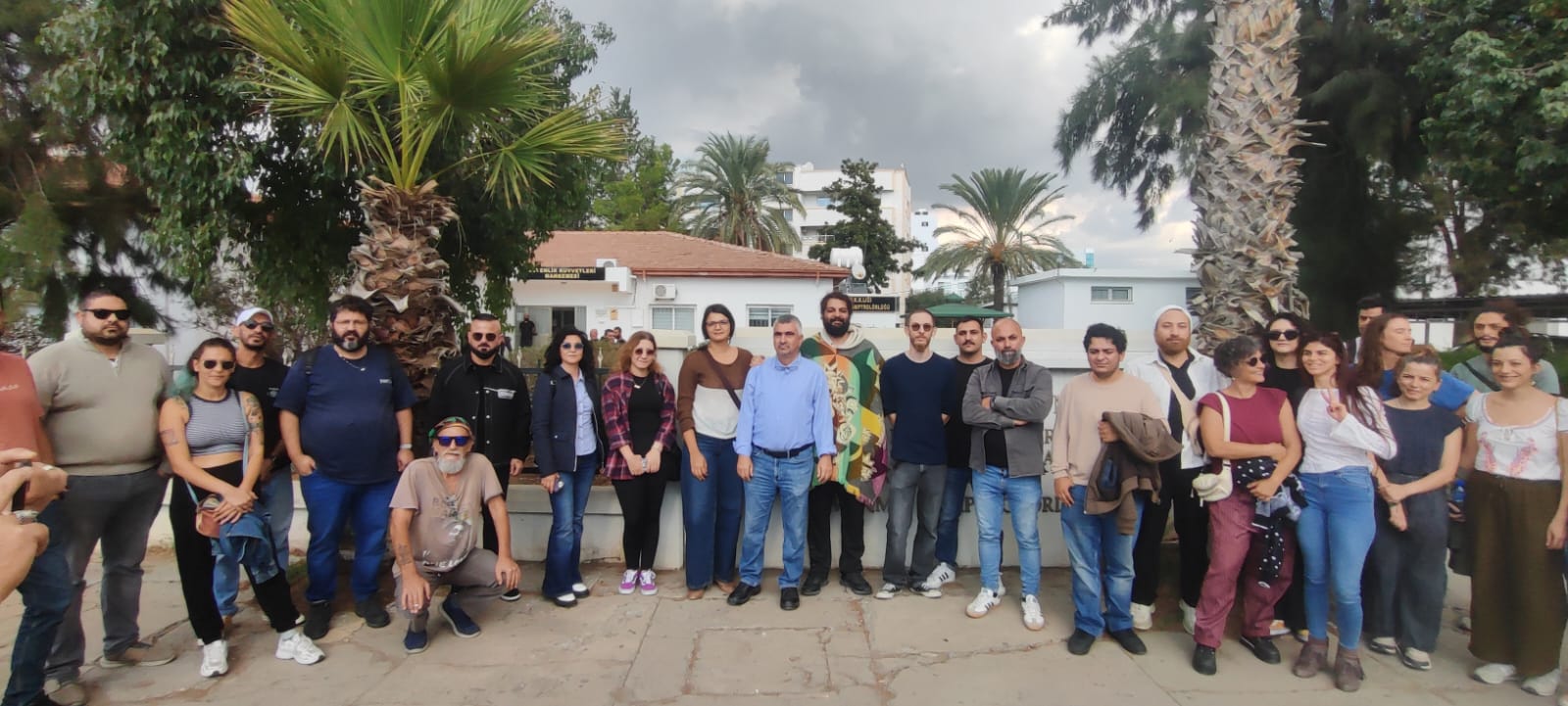 Hasan Rahvancıoğlu with multiple supporters and human rights observers outside the Security Forces Court